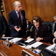 Committee chairman Chuck Grassley speaks with Democrats Dianne Feinstein and Patrick Leahy.